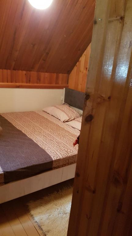 Postel nebo postele na pokoji v ubytování EtnoPetra