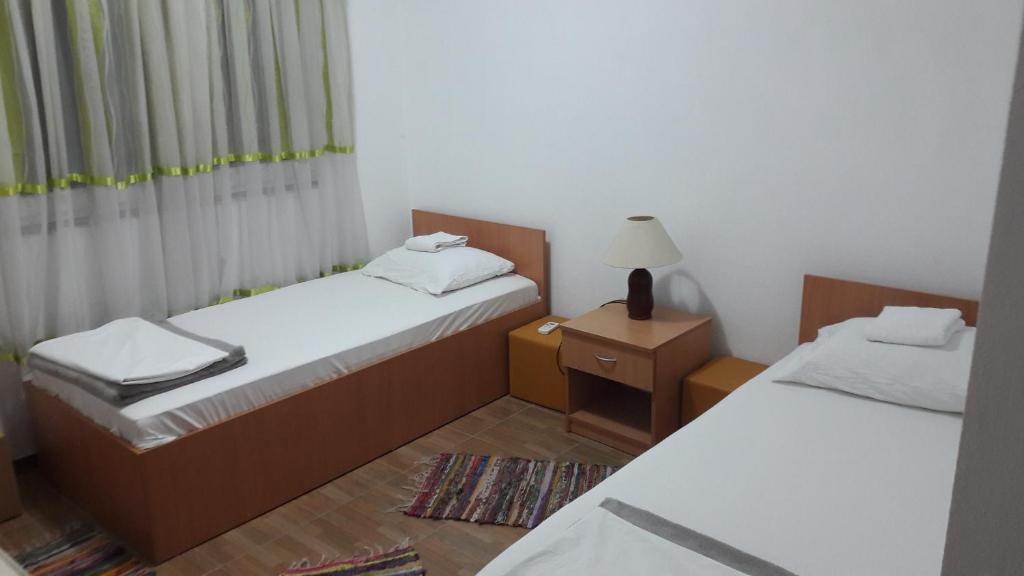 Postel nebo postele na pokoji v ubytování Hostel Hercegovina