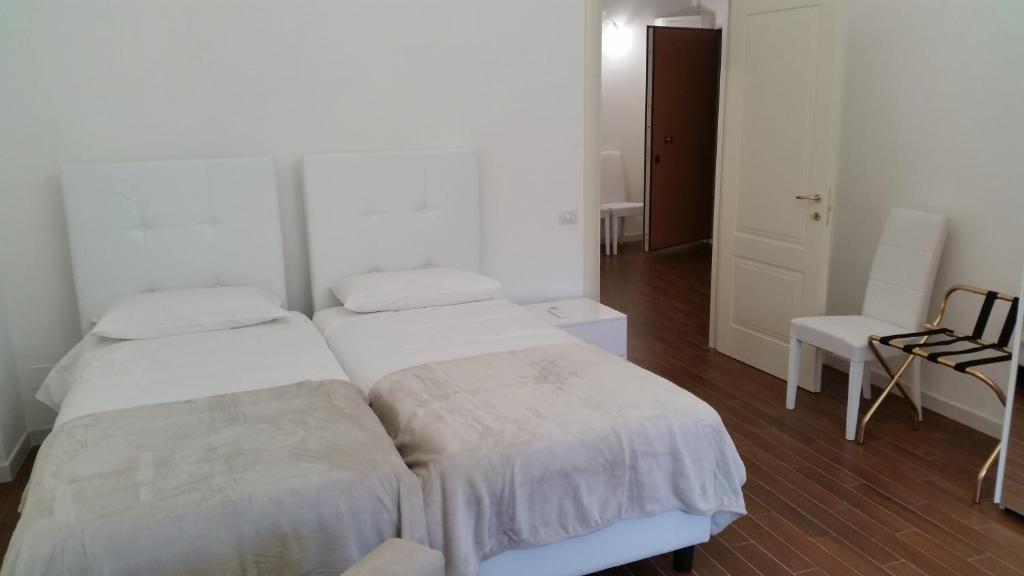 Postel nebo postele na pokoji v ubytování ISONZO COMFORT APARTAMENT