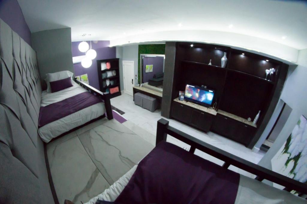 TV a/nebo společenská místnost v ubytování Gran Hotel Cantera La plaza