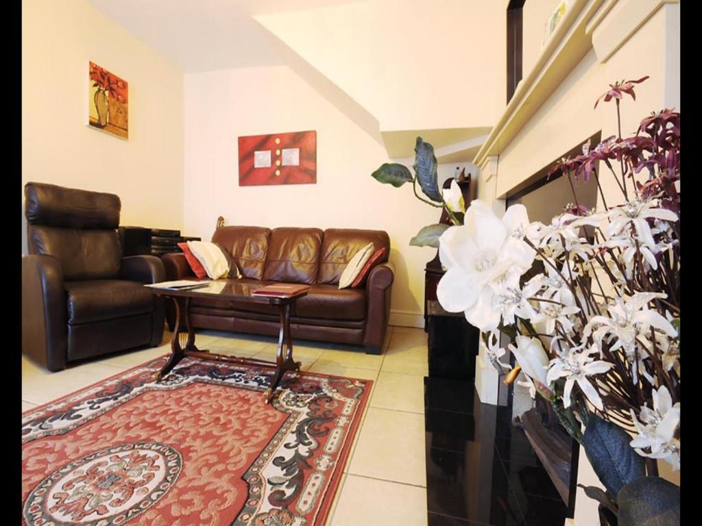 Posezení v ubytování Sive Budget Accommodation