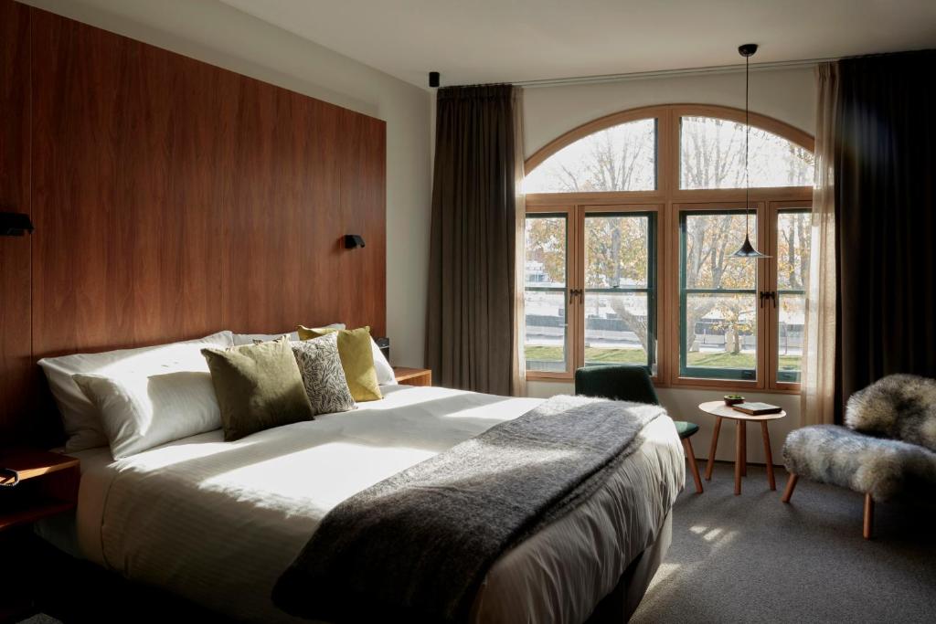 Postel nebo postele na pokoji v ubytování Moss Hotel
