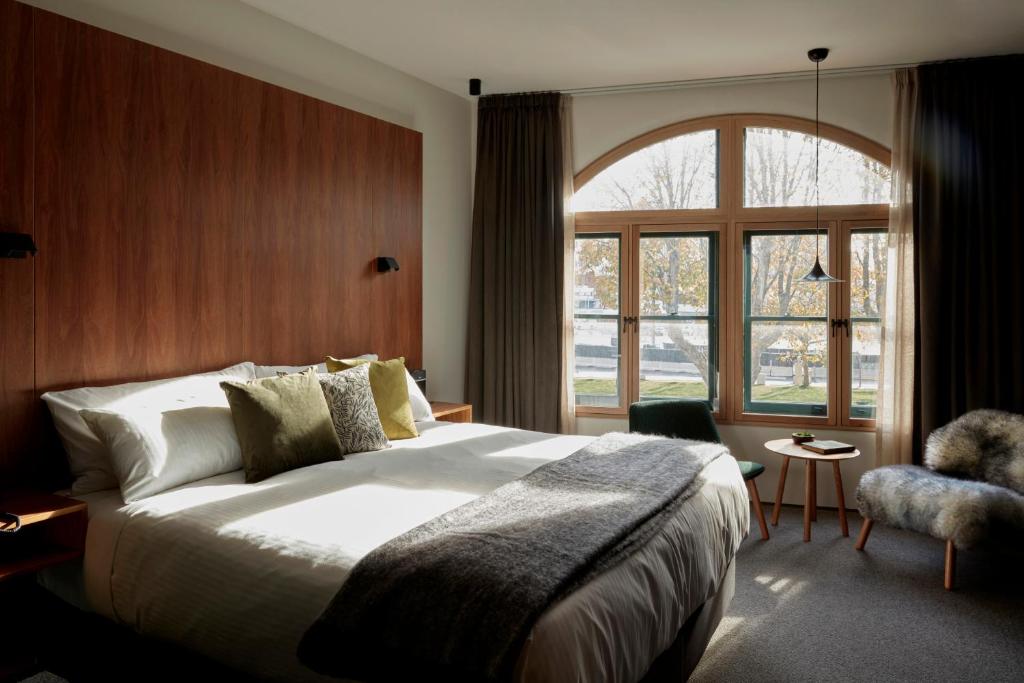 Säng eller sängar i ett rum på Moss Hotel