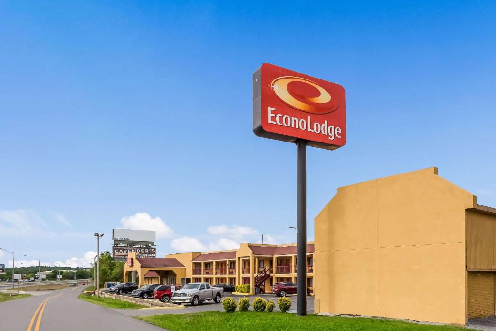 a sign for a corona lounge in front of a store at Econo Lodge McAlester in McAlester