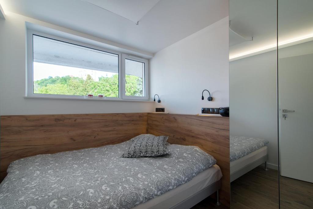 Posteľ alebo postele v izbe v ubytovaní Apartamenty Rynek3 , Kazimierz Dolny
