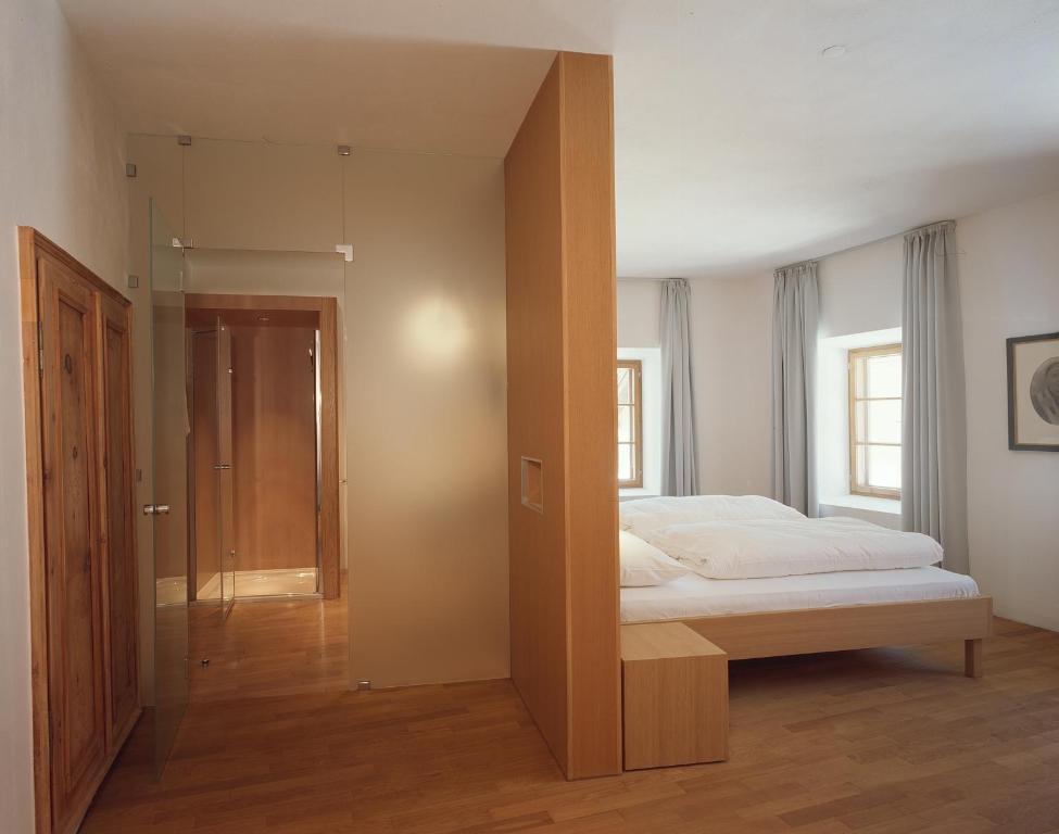 Postel nebo postele na pokoji v ubytování Hotel Gasthof Grüner Baum