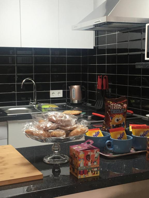 Kuchyň nebo kuchyňský kout v ubytování Luxury Apartamento Minerva Júpiter
