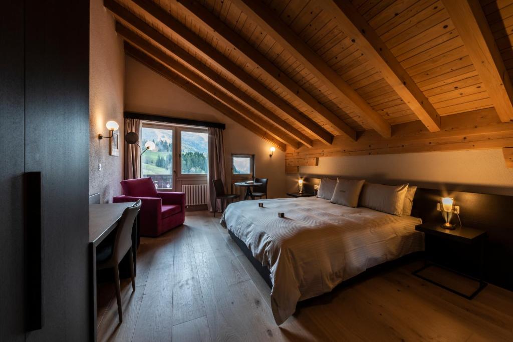 Postel nebo postele na pokoji v ubytování Hotel Maya Caprice