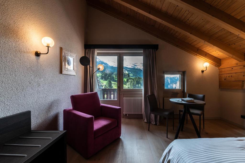 Postel nebo postele na pokoji v ubytování Hotel Maya Caprice