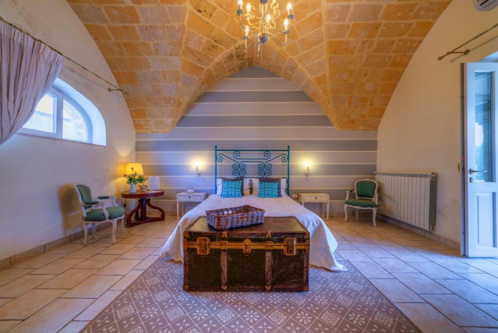 Postel nebo postele na pokoji v ubytování Masseria Sorani