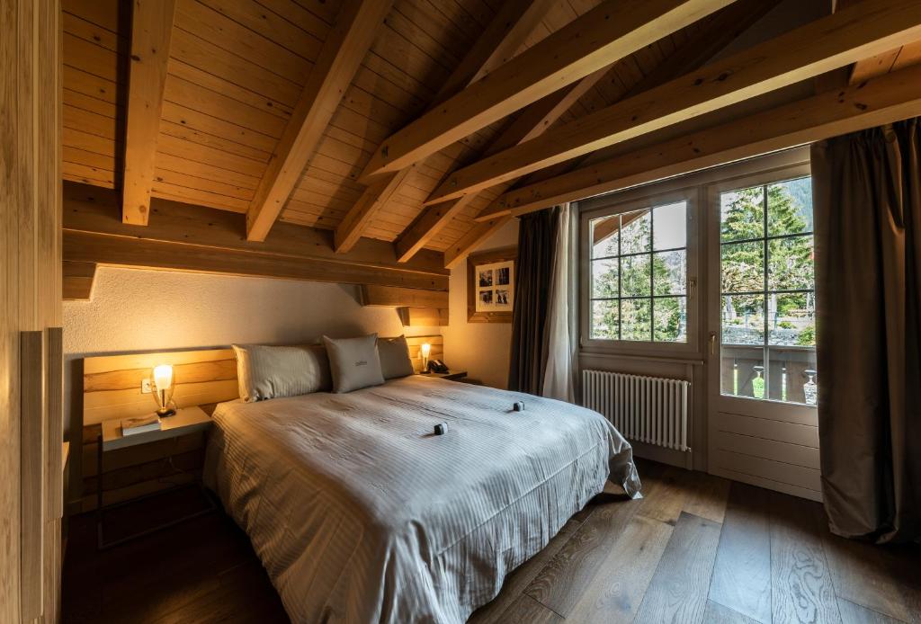 Postel nebo postele na pokoji v ubytování Hotel Maya Caprice