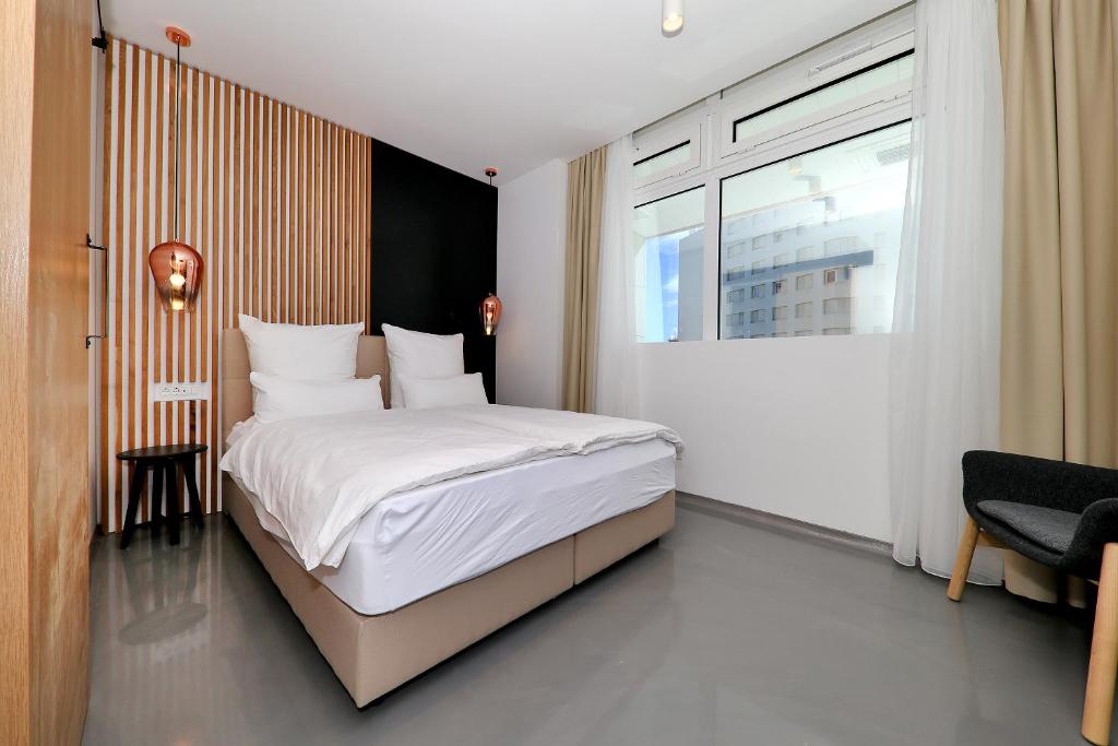 Postel nebo postele na pokoji v ubytování White Rooms Zadar345