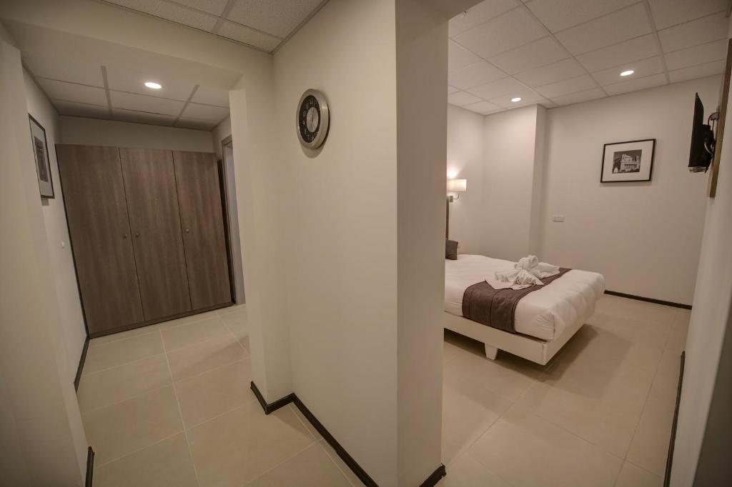 Postel nebo postele na pokoji v ubytování Europa Hotel