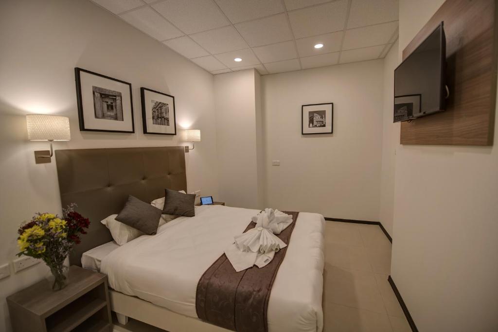 TV a/nebo společenská místnost v ubytování Europa Hotel