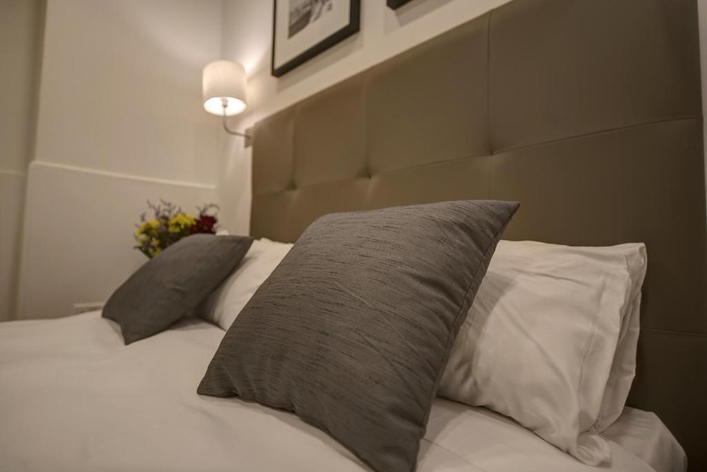 Postel nebo postele na pokoji v ubytování Europa Hotel