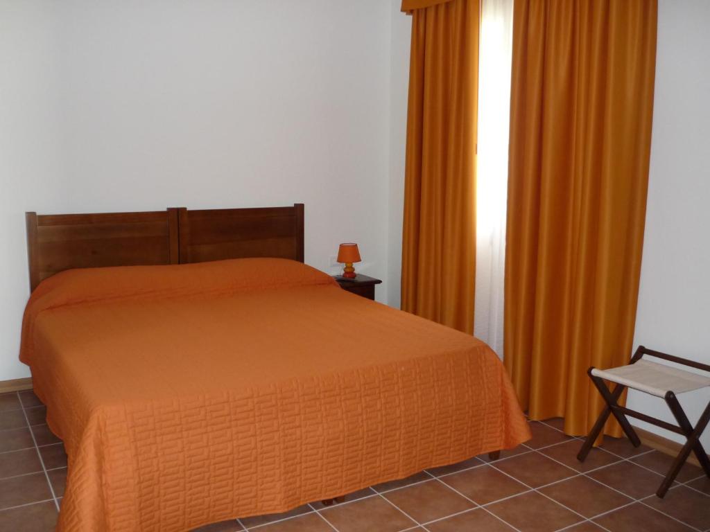 Postel nebo postele na pokoji v ubytování Agriturismo Ai Laghi