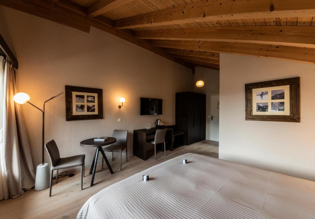 Postel nebo postele na pokoji v ubytování Hotel Maya Caprice