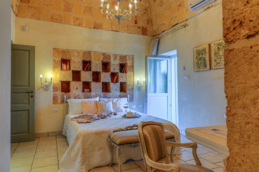 Postel nebo postele na pokoji v ubytování Masseria Sorani