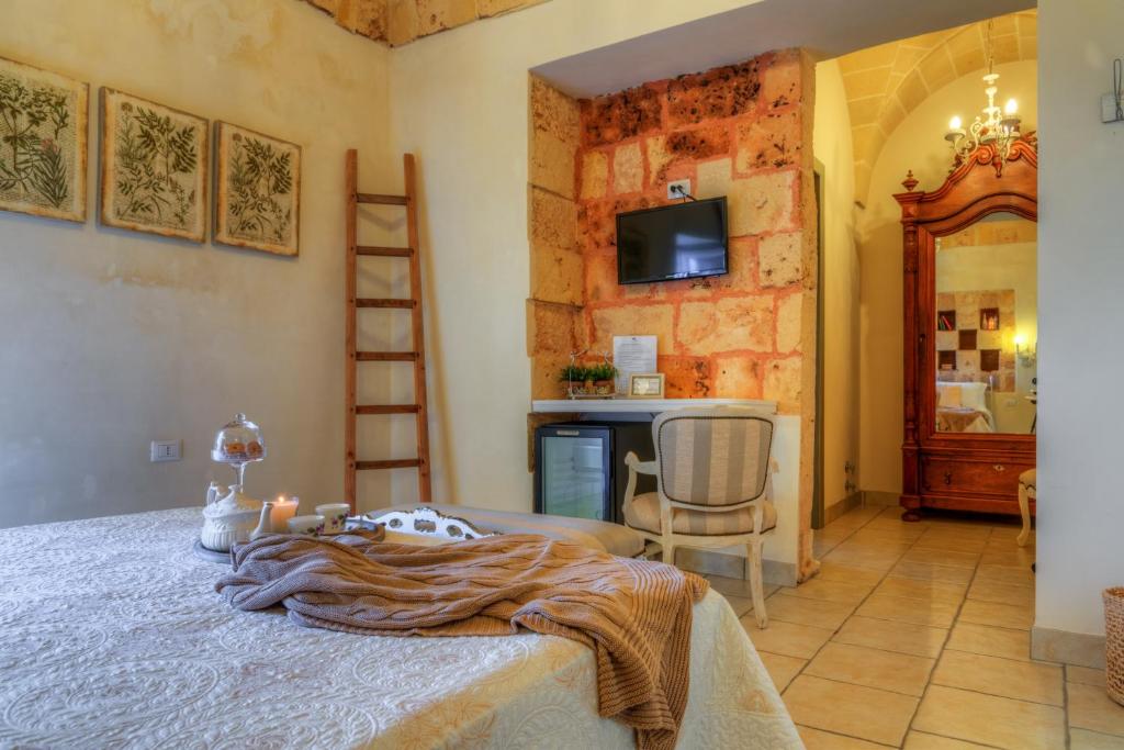Postel nebo postele na pokoji v ubytování Masseria Sorani