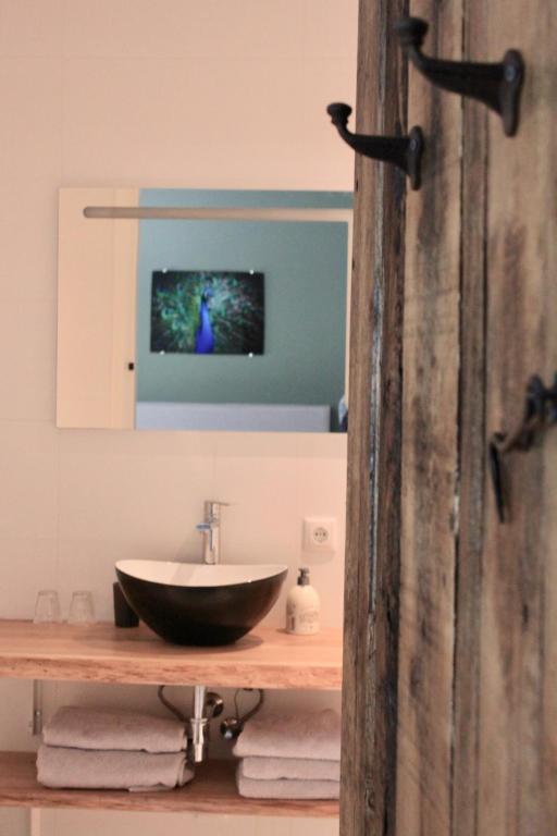 Koupelna v ubytování B&B de Sfeerhoeve