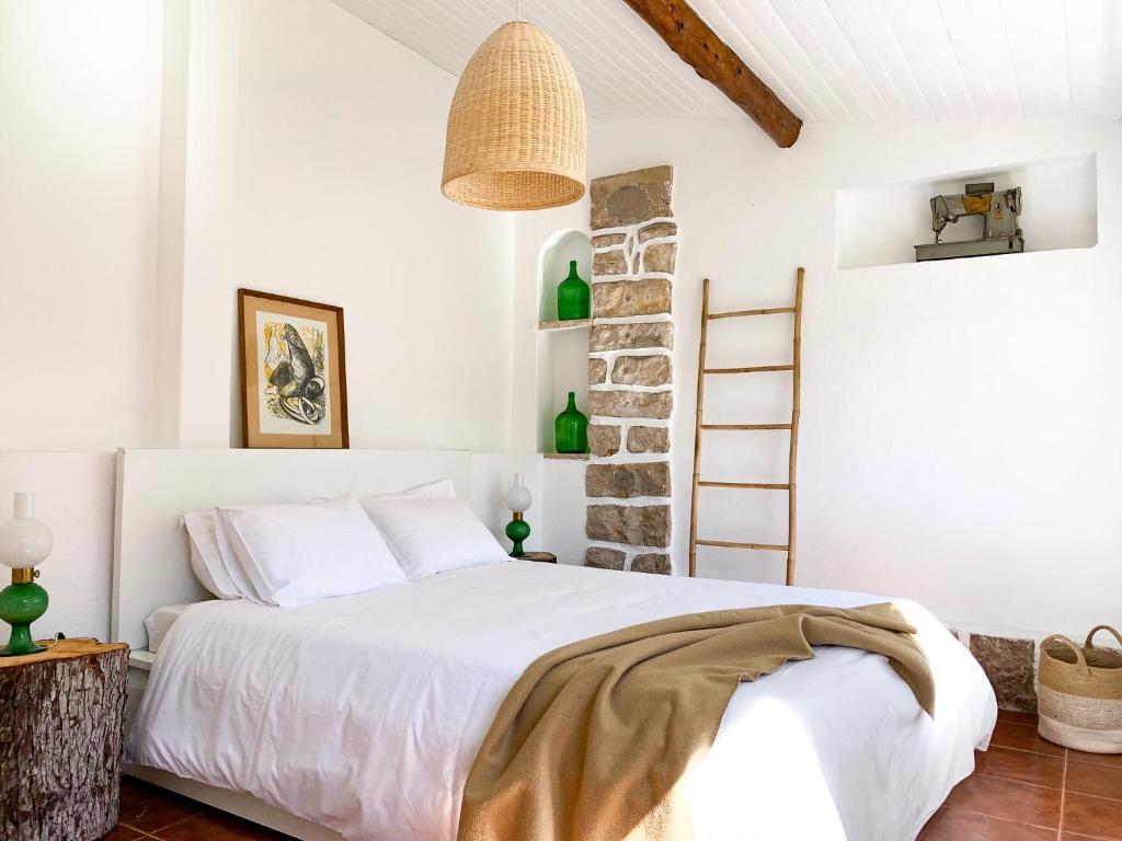 
Uma cama ou camas num quarto em Casa Saloia Sintra
