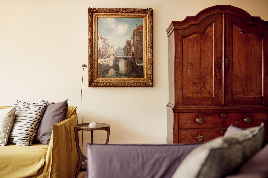 Postel nebo postele na pokoji v ubytování Hotel Miss Blanche