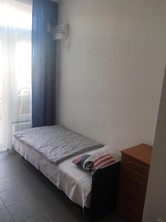 Postel nebo postele na pokoji v ubytování Tocc Apartman