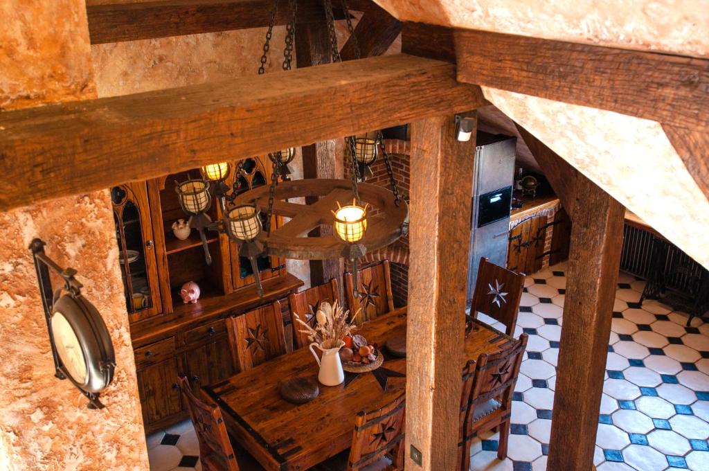 an overhead view of a restaurant with a table and chairs at Attic Apartment Warszawa in Warsaw
