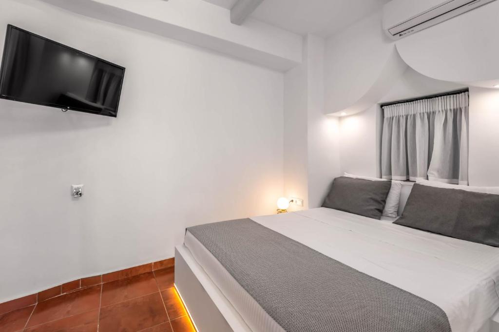 Postel nebo postele na pokoji v ubytování Casa De La Sera