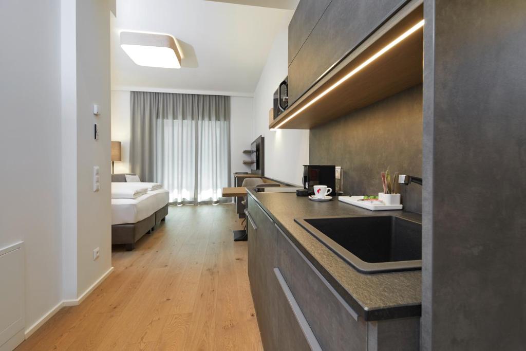 Postel nebo postele na pokoji v ubytování Hotel Gösser Bräu