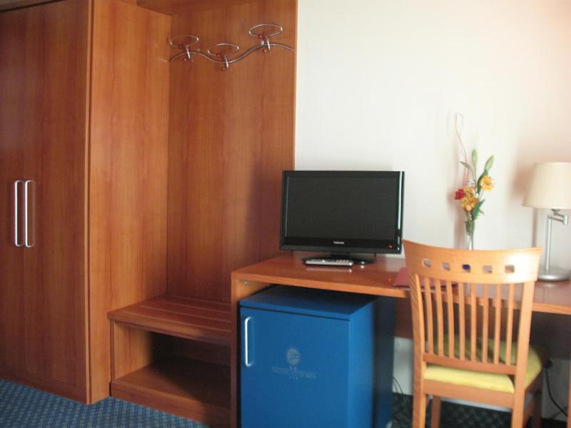 TV a/nebo společenská místnost v ubytování Hotel Vittoria