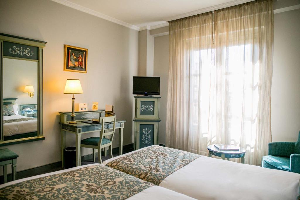 Postel nebo postele na pokoji v ubytování Palacio de los Velada