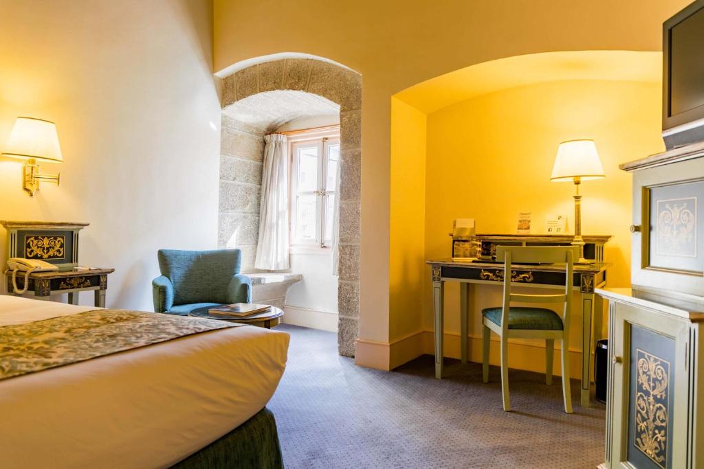 Postel nebo postele na pokoji v ubytování Palacio de los Velada