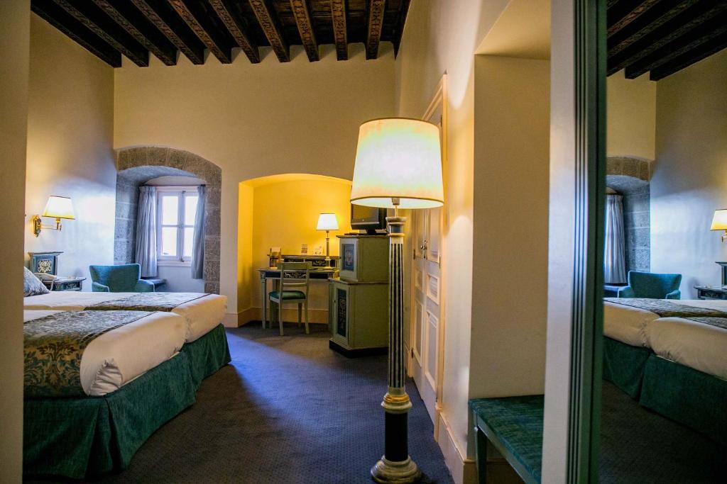Postel nebo postele na pokoji v ubytování Palacio de los Velada