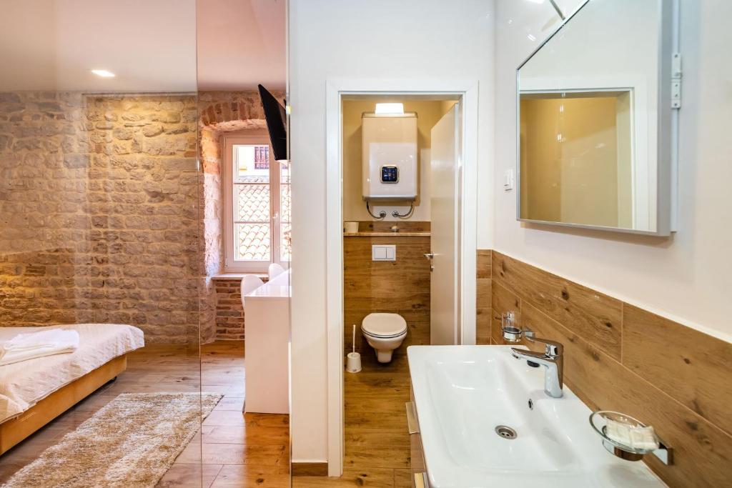 Koupelna v ubytování Idassa Atrium rooms
