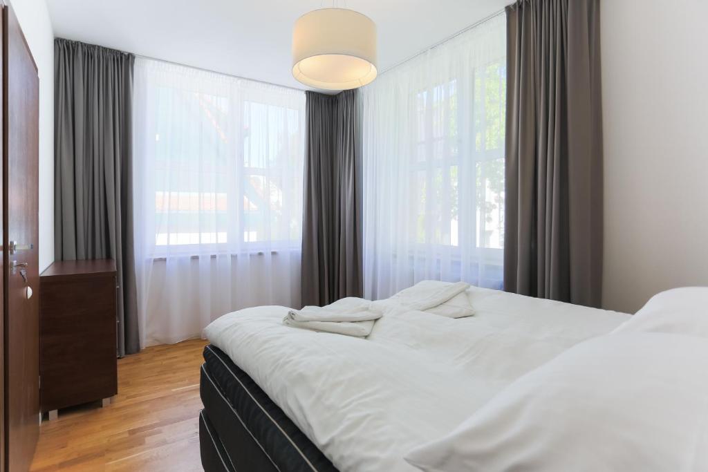 Posteľ alebo postele v izbe v ubytovaní Apartamenty Świnoujście - Rubin II
