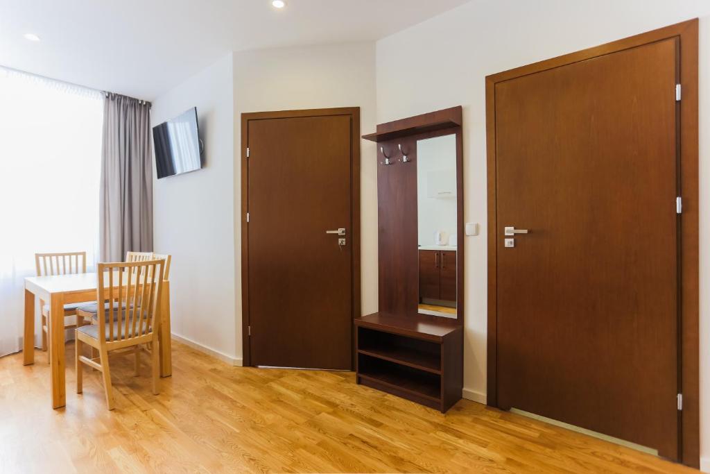 Televízia a/alebo spoločenská miestnosť v ubytovaní Apartamenty Świnoujście - Rubin II