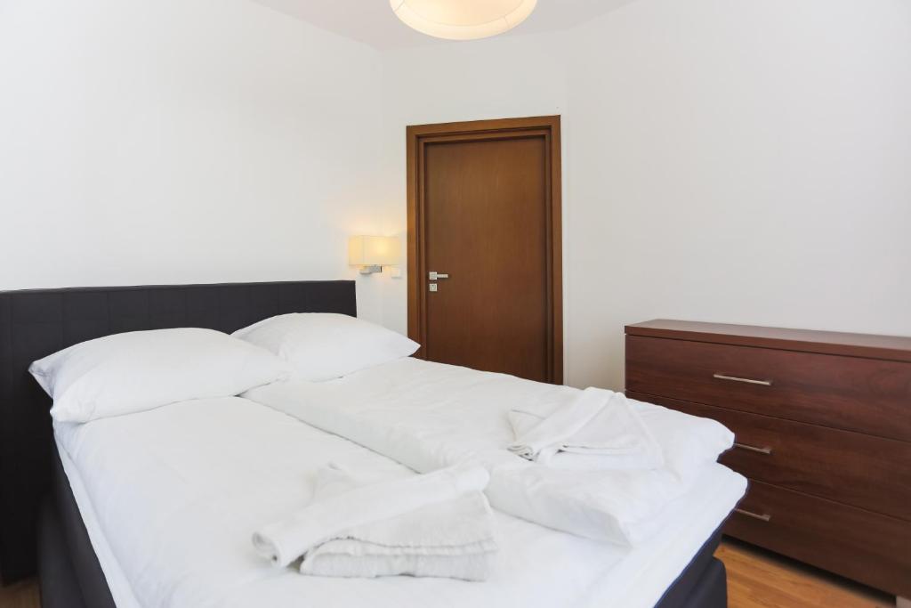Posteľ alebo postele v izbe v ubytovaní Apartamenty Świnoujście - Rubin II