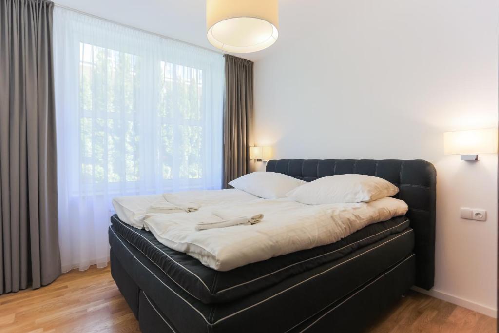 Posteľ alebo postele v izbe v ubytovaní Apartamenty Świnoujście - Rubin II