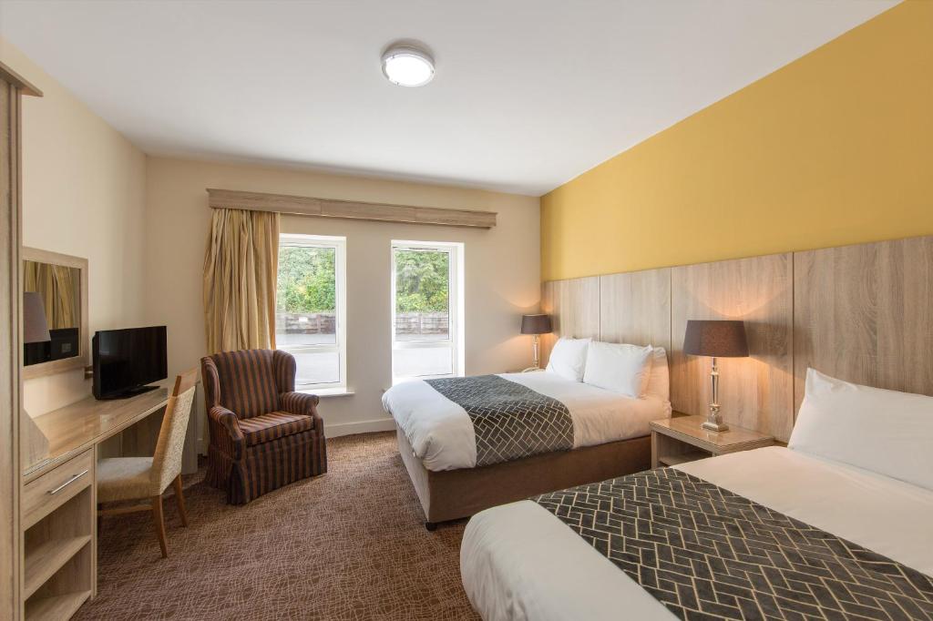 Postel nebo postele na pokoji v ubytování Wilton Hotel Bray