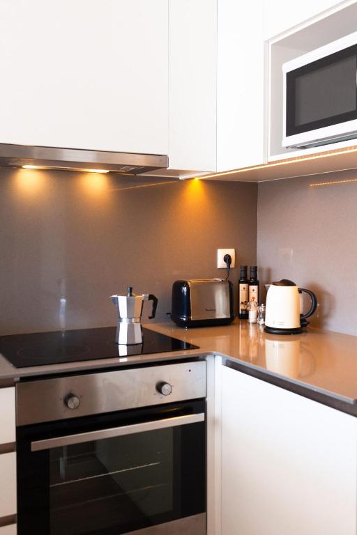Kuchyňa alebo kuchynka v ubytovaní Brummell Apartments Poble Sec