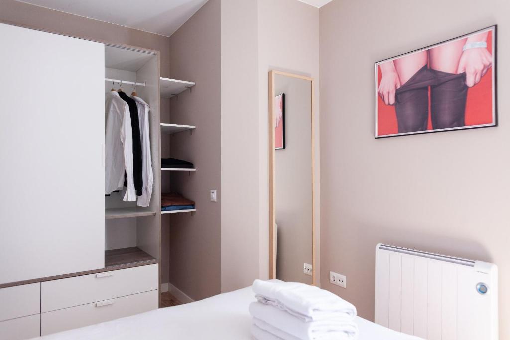 Posteľ alebo postele v izbe v ubytovaní Brummell Apartments Poble Sec