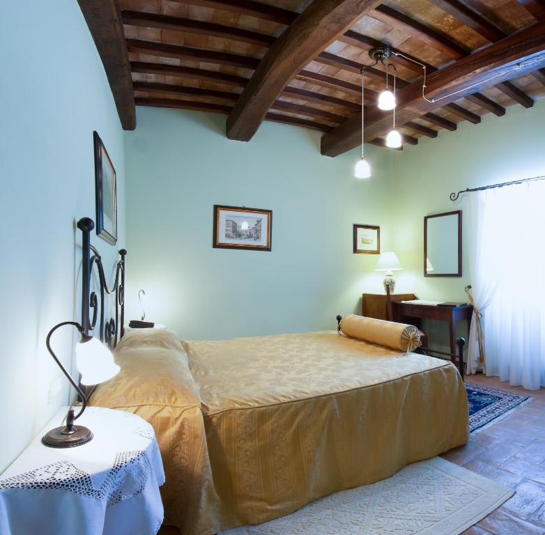 Postel nebo postele na pokoji v ubytování Hotel & SPA L'Antico Forziere