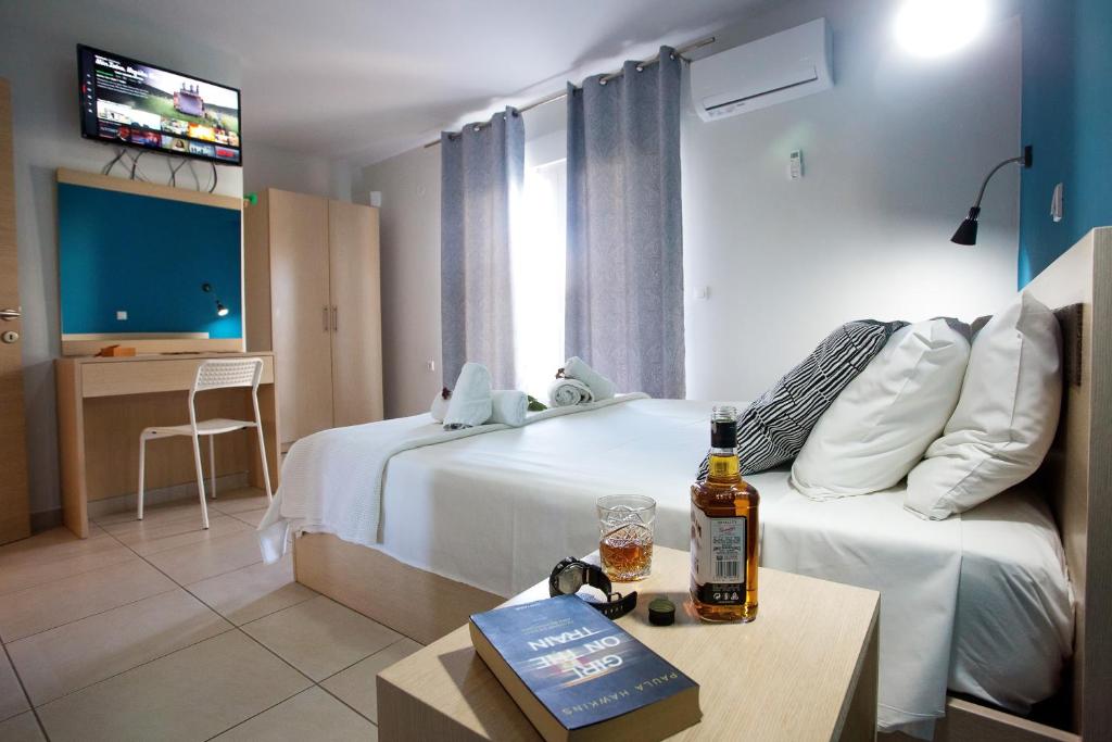 TV a/nebo společenská místnost v ubytování ILIDA apartments