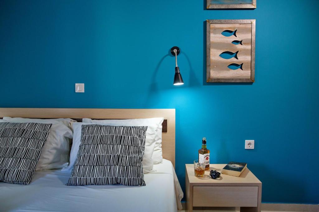 Postel nebo postele na pokoji v ubytování ILIDA apartments
