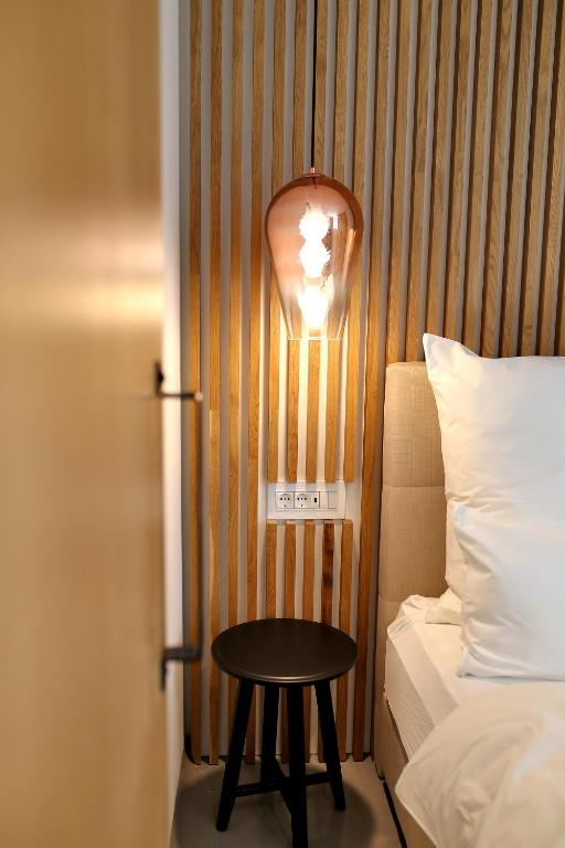 Postel nebo postele na pokoji v ubytování White Rooms Zadar345