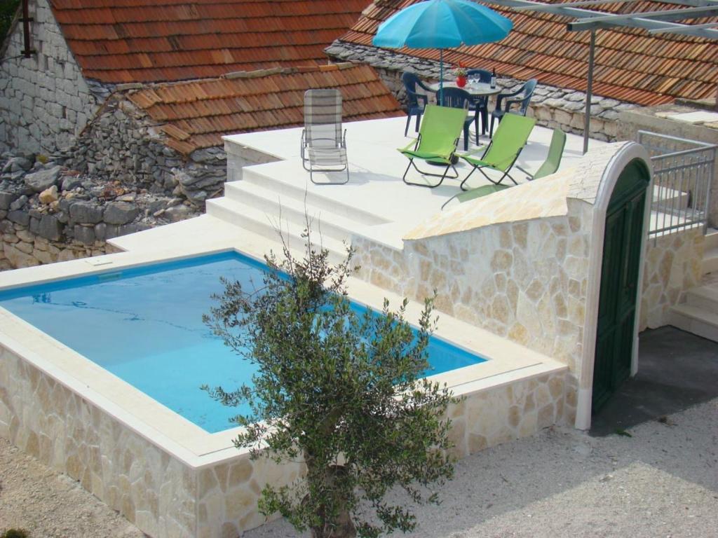 Bazén v ubytování Stone house Zgogo nebo v jeho okolí