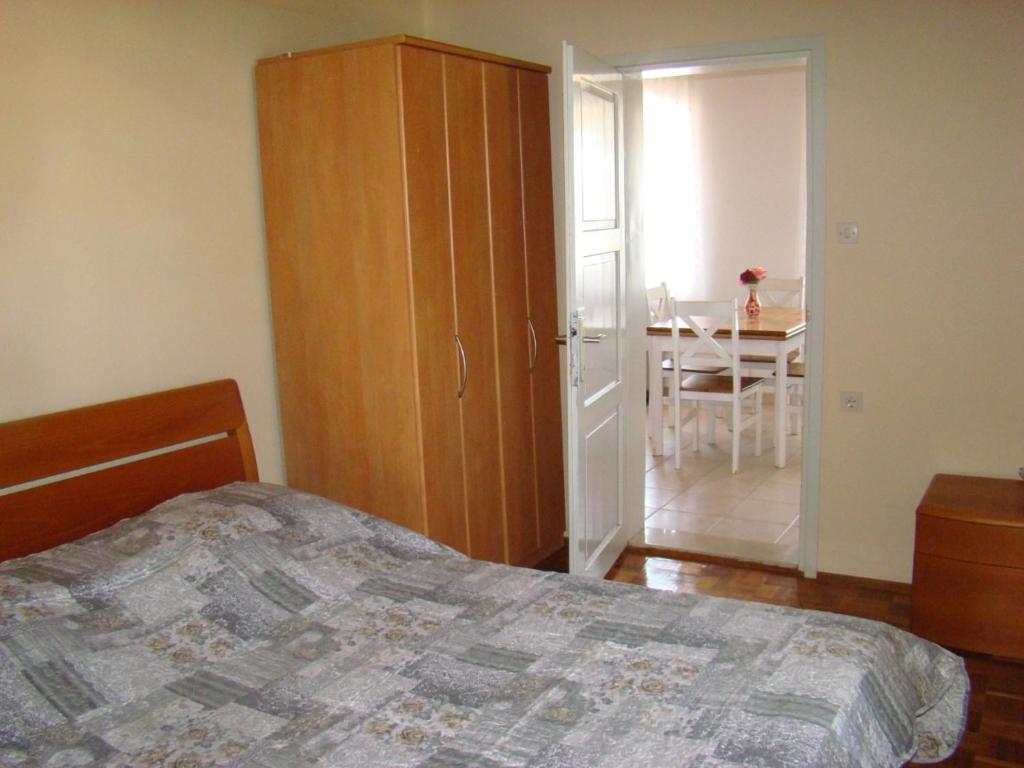 Postel nebo postele na pokoji v ubytování Stone house Zgogo