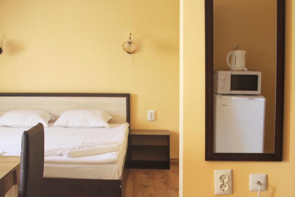 Postel nebo postele na pokoji v ubytování Horizont Apartments