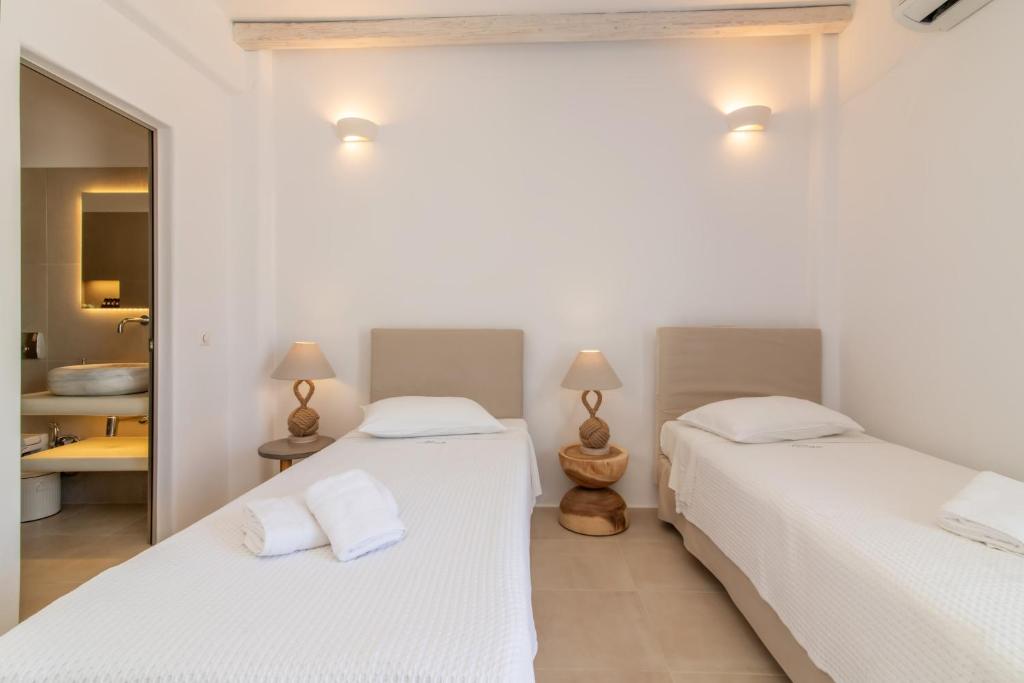 Voodi või voodid majutusasutuse Vincenzo Family Rooms toas